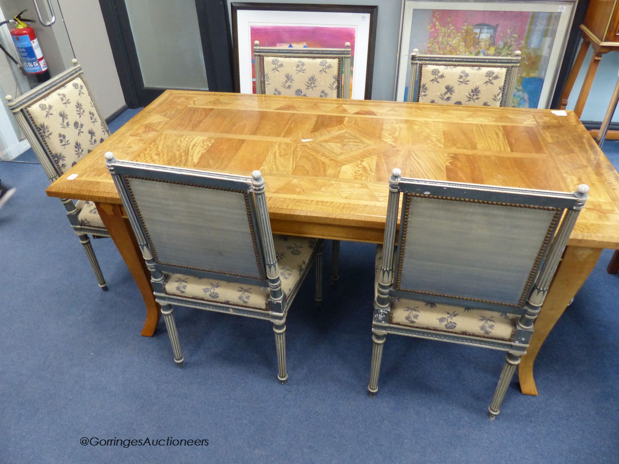 A rectangular Continental parquetry dining table, length 180cm, depth 90cm, height 75cm